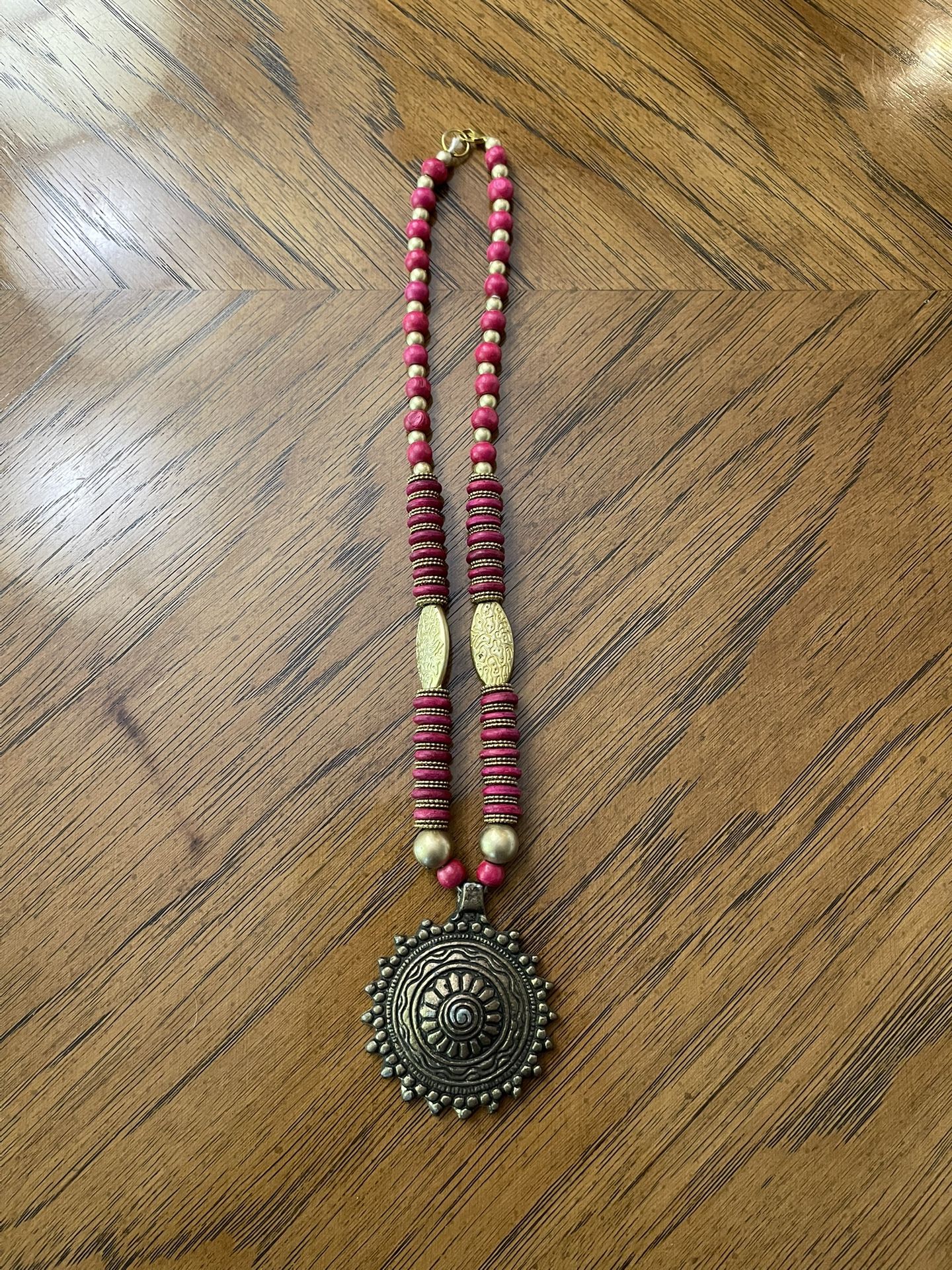 Beautiful Red and Gold Toned Statement Piece  Beaded Necklace with Metal Pendant