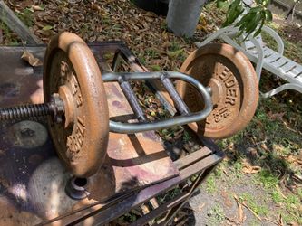 Bar Bell With  2/25lbs Plates