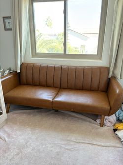 Pick up Bell Rd. & 51 highway.  Lays down flat to be a futon. 