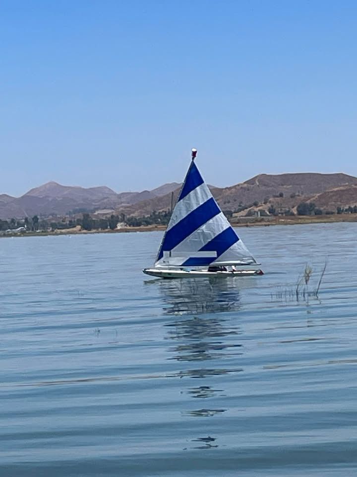 Sunfish Sailboat With Trailer And New Sail