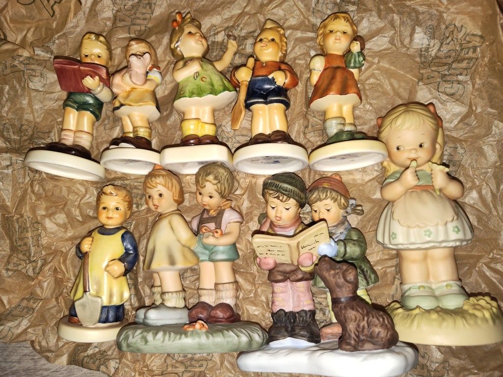 9 Hummel Figurines 