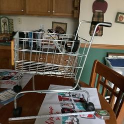 Pottery Barn Kids Metal baby doll shopping cart buggy, has seat belt for doll, chalkboard front, plastic handle cover, steel frame, heavy duty wheels.