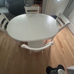 White Expanding Table With Chairs