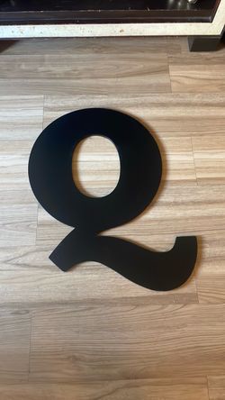 Q hanging letter signs
