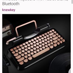 Wireless old-fashioned keyboard for iPad with tablet stand