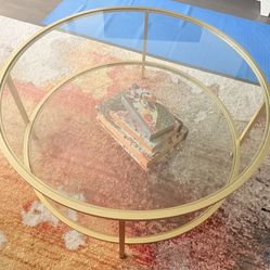 Round Glass And Gold Coffee Table
