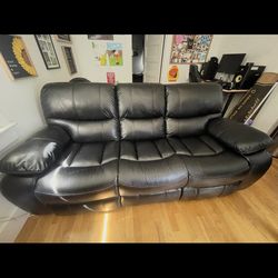 Couch with reclining seats 