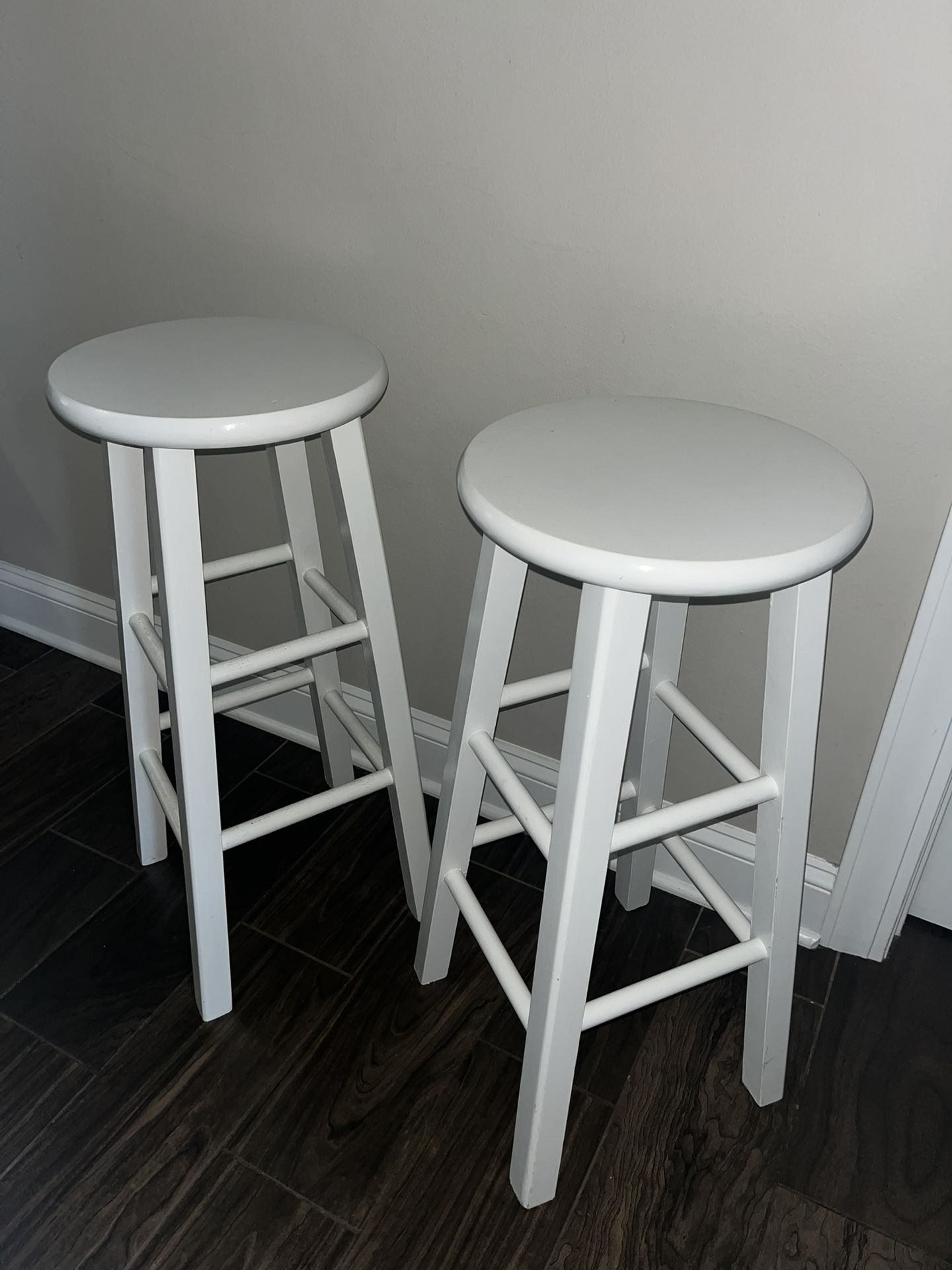 2 White Matching Wooden Stools