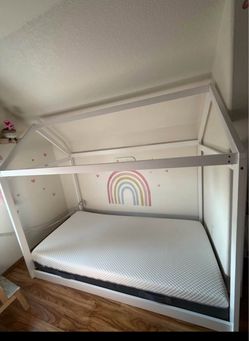 Twin size white house-style bed frame