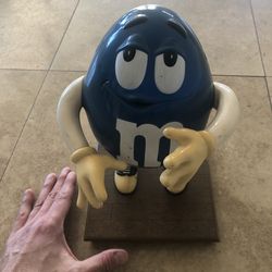 Blue peanut M&M dispenser from the 80s (collector’s item! 👍🏼) Must come to Huntington Beach