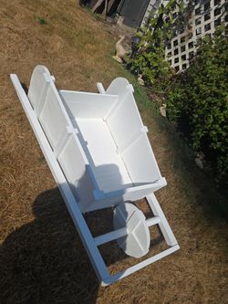 White wooden wheelbarrow