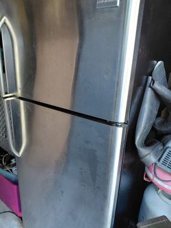 Frigidaire fridge stainless steel used normal wear 30w  x 66 H