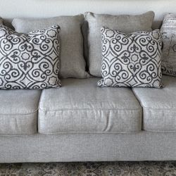 Beautiful Light Grey Sofa With Decorative Pillows 