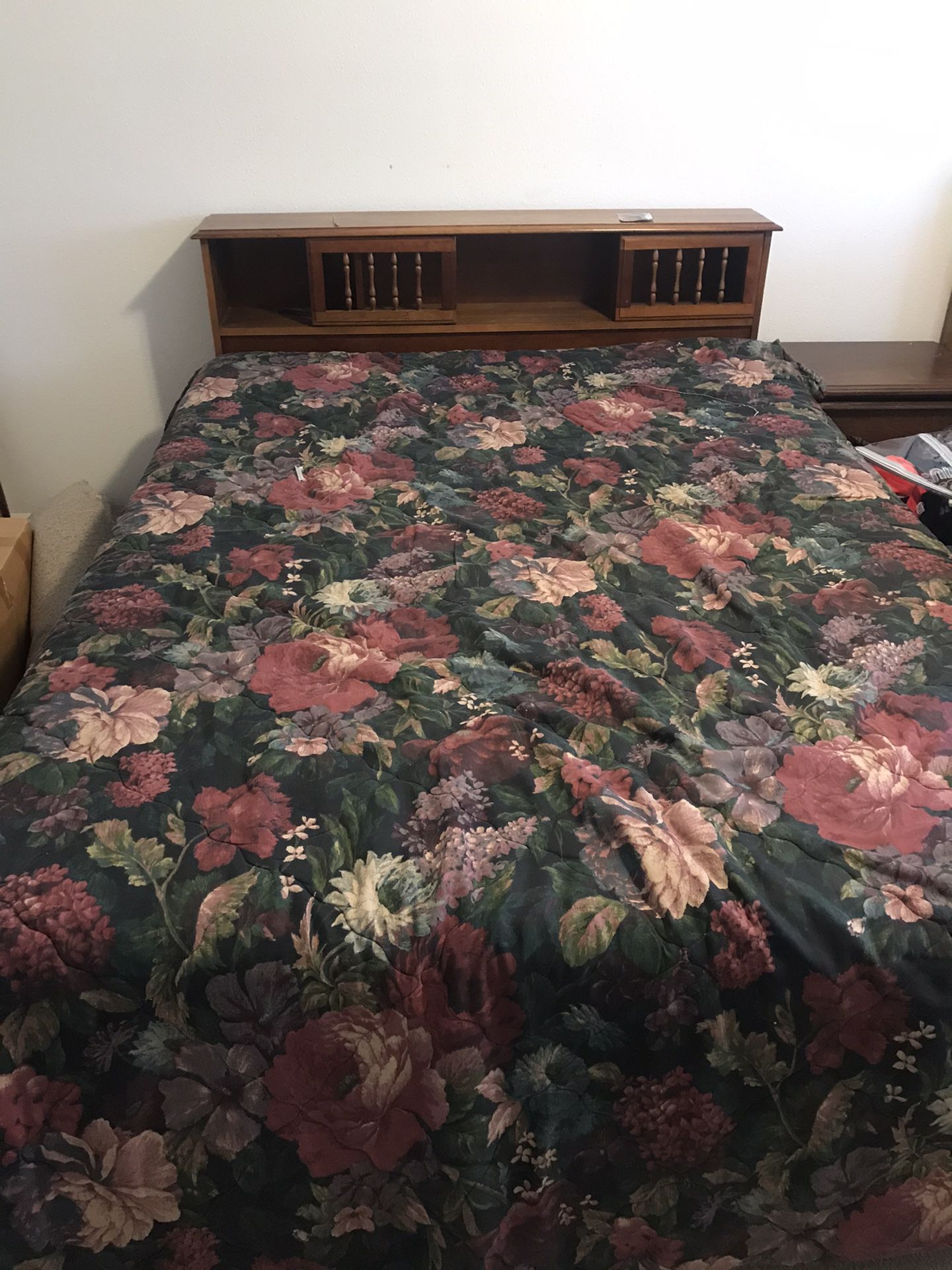 Queen size bed with mattresses and frame.