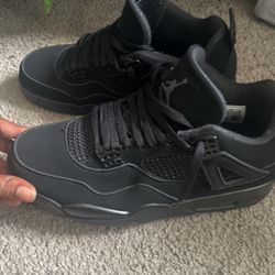 Black Cat Jordan 4s
