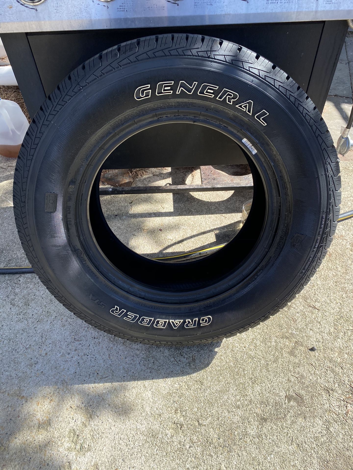 Pair of General Grabber STX Tires, 235/70R16, 106T