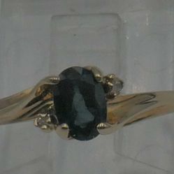 10KT YELLOW GOLD RING 1.5 GRAMS W 2 SMALL DIAMONDS AND BLUE STONE SIZE 6.25 MINT. 867682-1.