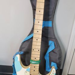 White Electric Guitar With Blue And Green Dots