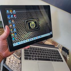 HP elite Touch Smart notebook tablet - $280