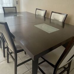 Dining room table with six chairs