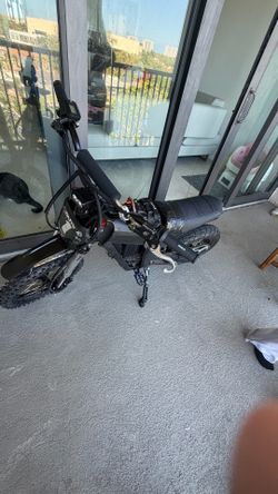 Modded Tuttio E-Moto w/ Surron Battery Setup
