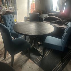 Wooden table with 4 chairs