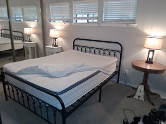 Black Metal Queen Bed Frame with pillow top mattress