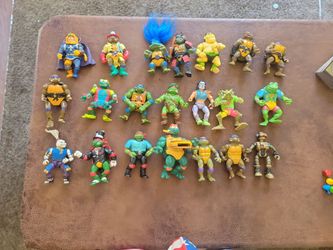 Rare vintage Teenage Mutant Ninja turtle action figures.