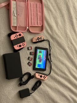 Nintendo switch with games and case