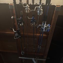 7 Fishing Rods and Box with Fishing Items 