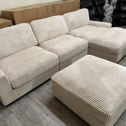 Beige corduroy sectional sofa with ottoman