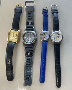 Assorted Disney watch collection includes Mickey &  grump Disney  Watch Lot Of 4. All would need a new batteries. Location below  31705 CR 54,  Wesley
