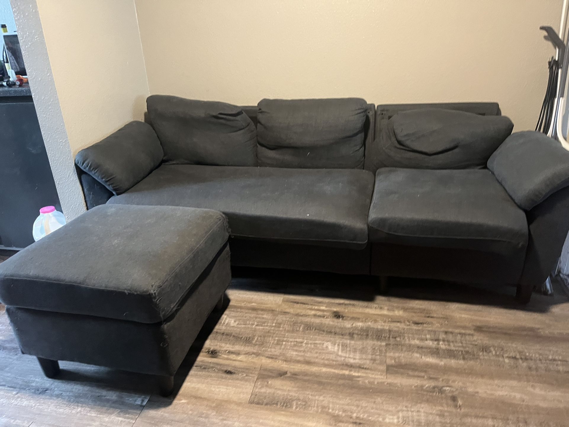 Grey Couch With Detached Ottoman