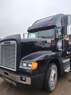 1996 FREIGHTLINER FLD120. ROLLBACK FLATBED TOW TRUCK