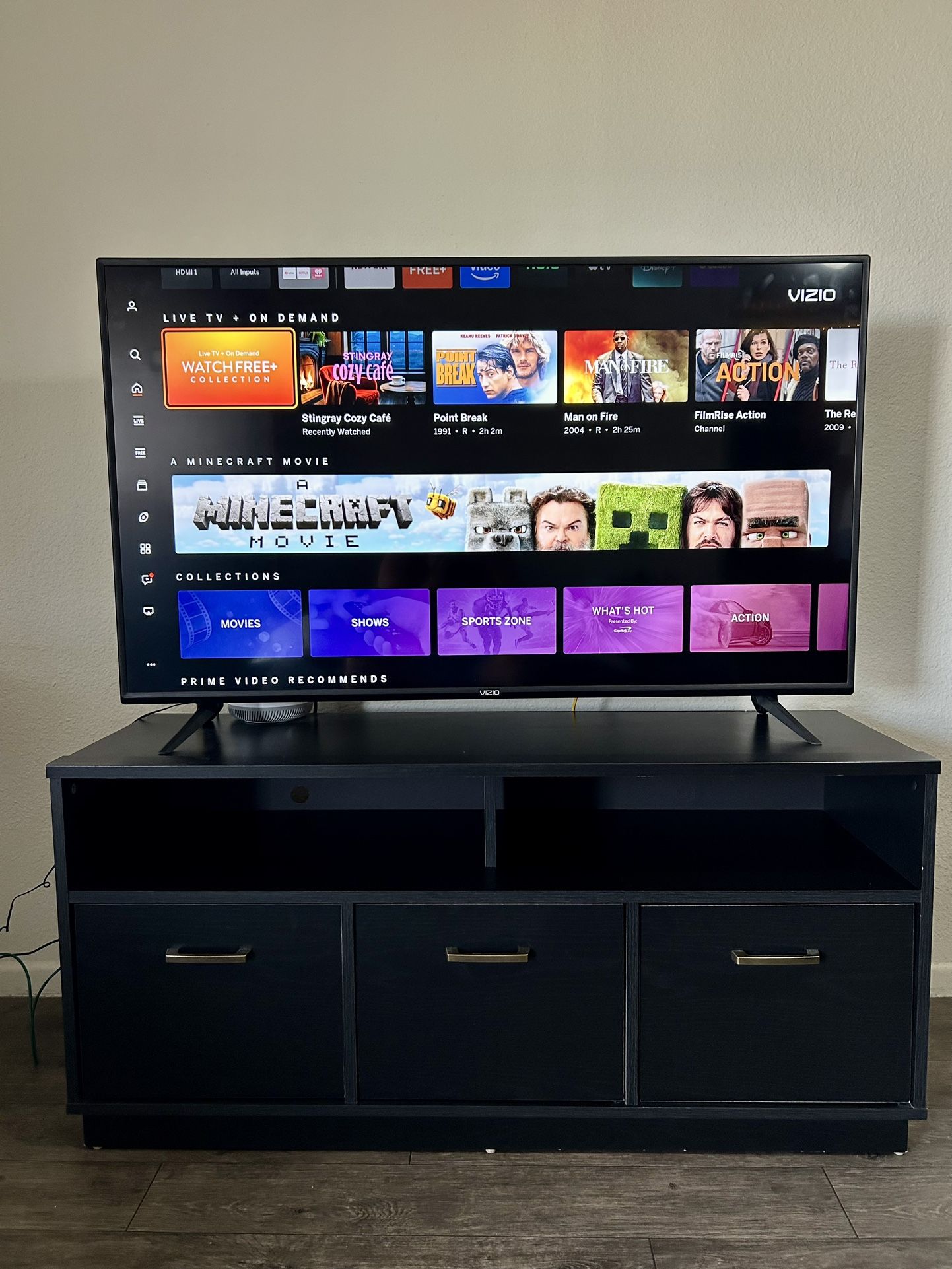 50” Vizio Smart TV with a TV stand (Valued at $330)