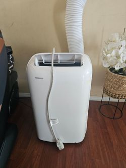 AC PORTABLE TOSHIBA 6000 BTU IS TOUCH SCREEN, SLEEP TIMER, MODE,WORKS GREAT YOU CAN TEST IT BEFORE PURCHASE FOR ANY QUESTION TEXT ME PLEASE