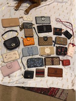 Lots of wallets!! Some brand new!!