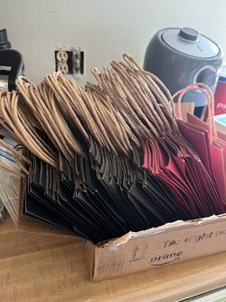 56 SMALL BLACK AND PINK GIFT BAGS