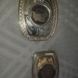 Silver dollar cutouts In belt buckle