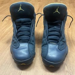 Nike Air Jordan 13 Retro Squadron Blue sneaker with electric yellow accents. Size 10 Men’s