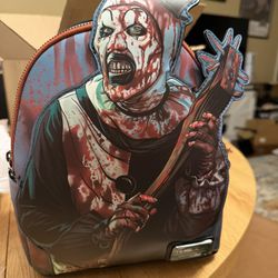Loungefly Terrifier Art the Clown Mini Backpack EE Exclusive Glow mini backpack