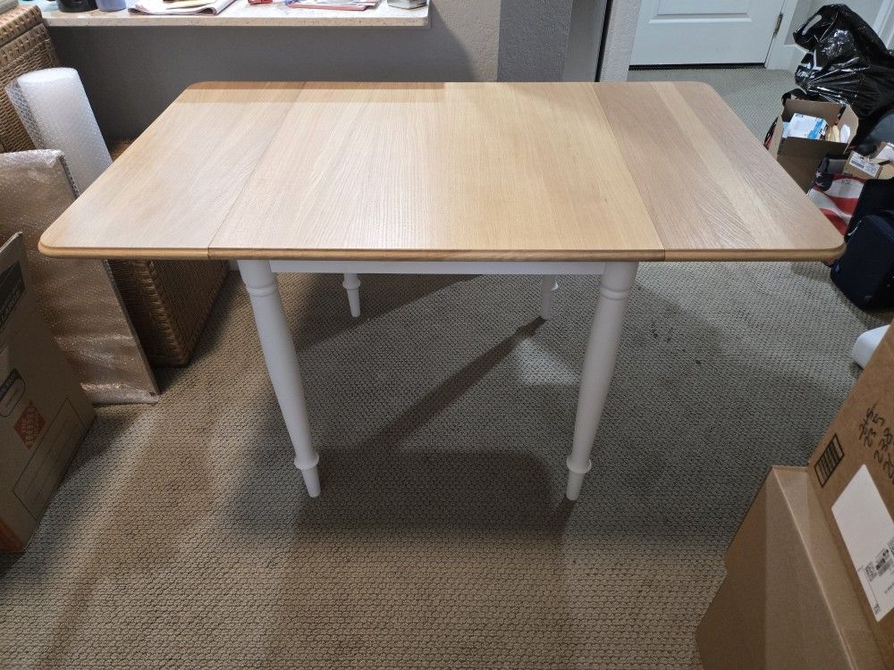 Expanding Dining Room Table And Two Chairs
