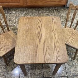 Pre Owned Solid Oak Wooden Kids Table with 2 Solid Oak Chairs Made In USA
