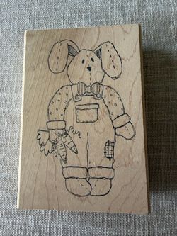 Bunny holding carrots rubber stamp