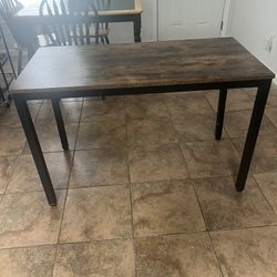 BROWN WOODEN TABLE