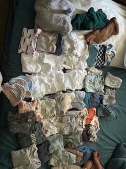 baby boy clothes and diapers