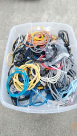 Box full of internet cables CAT5, CAT6, most of them are patched both ends. Different planks from one feet to 50 +