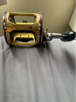 2 PENN 113H 4/0 with Tiburon frame