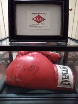 Floyd Mayweather signed boxing glove in display case with certificate of authenticity
