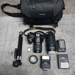 Nikon Camera With Tripod, Fish Eye Lens, Flash,and 2 Batteries 